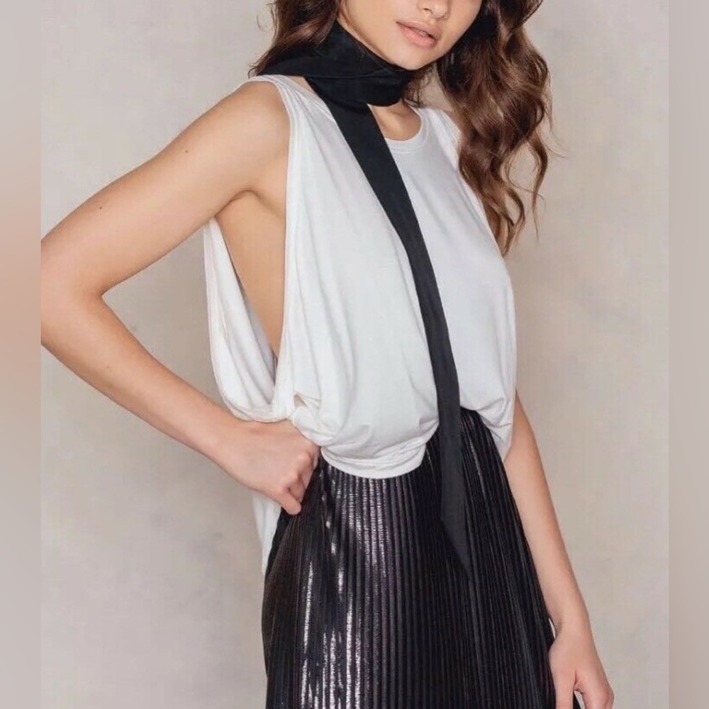 FREE PEOPLE IVORY SLEEVELESS DROPPED ARMHOLE LITTLE ROCK TANK TOP Sz M